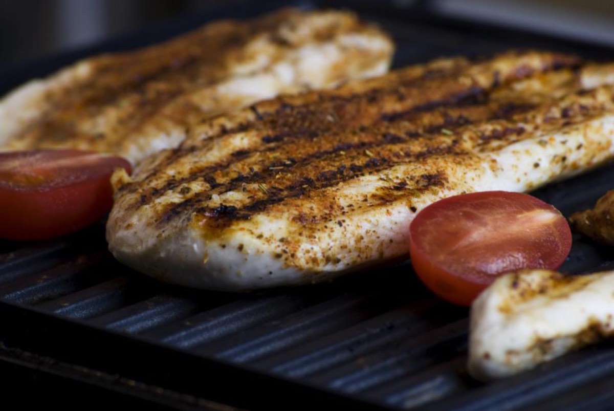 Food grilling, ready for a potluck-style gathering